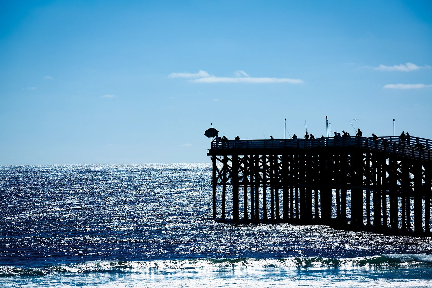 Sunlit California Fishermen Pier and Shimmering Waves of the Pacific Ocean. Actual format of the artwork.