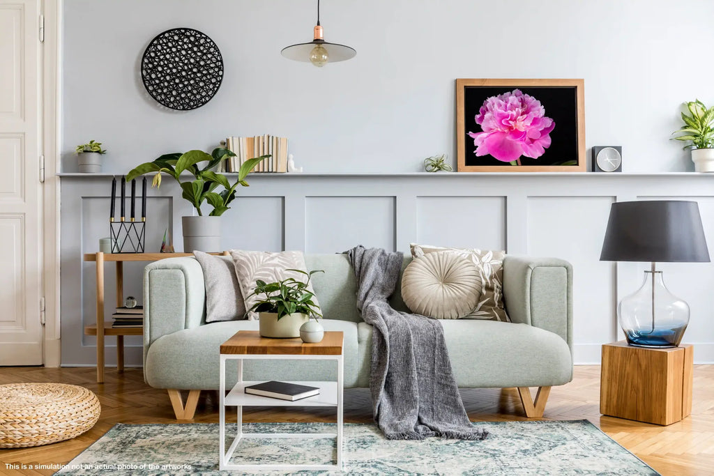 Living room with a gray sofa, coffee table, and decorative items.