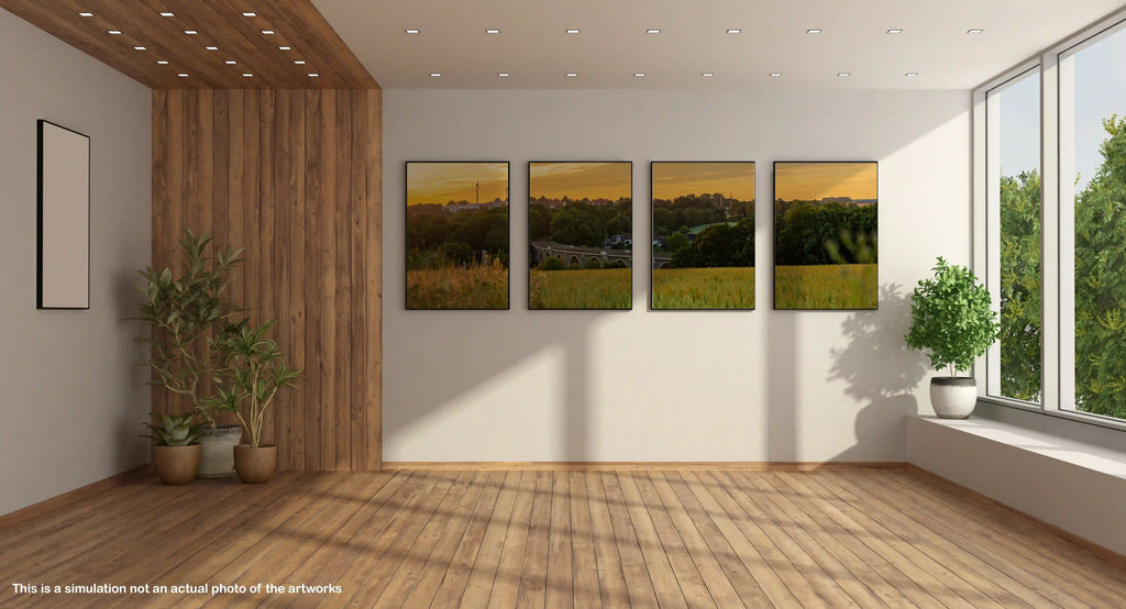 Modern interior with wall art depicting a landscape, plants, and large windows.