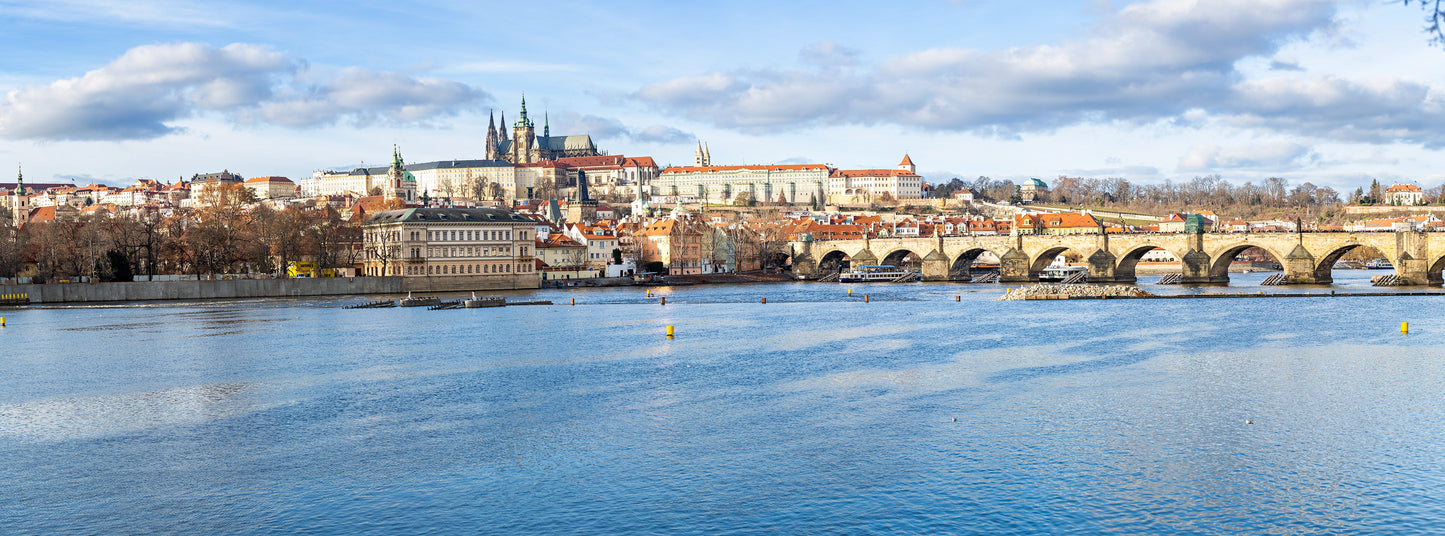 Stunning panoramic view capturing the historic Charles Bridge as it stretches across the serene Vltava River. Actual format of the artwork.