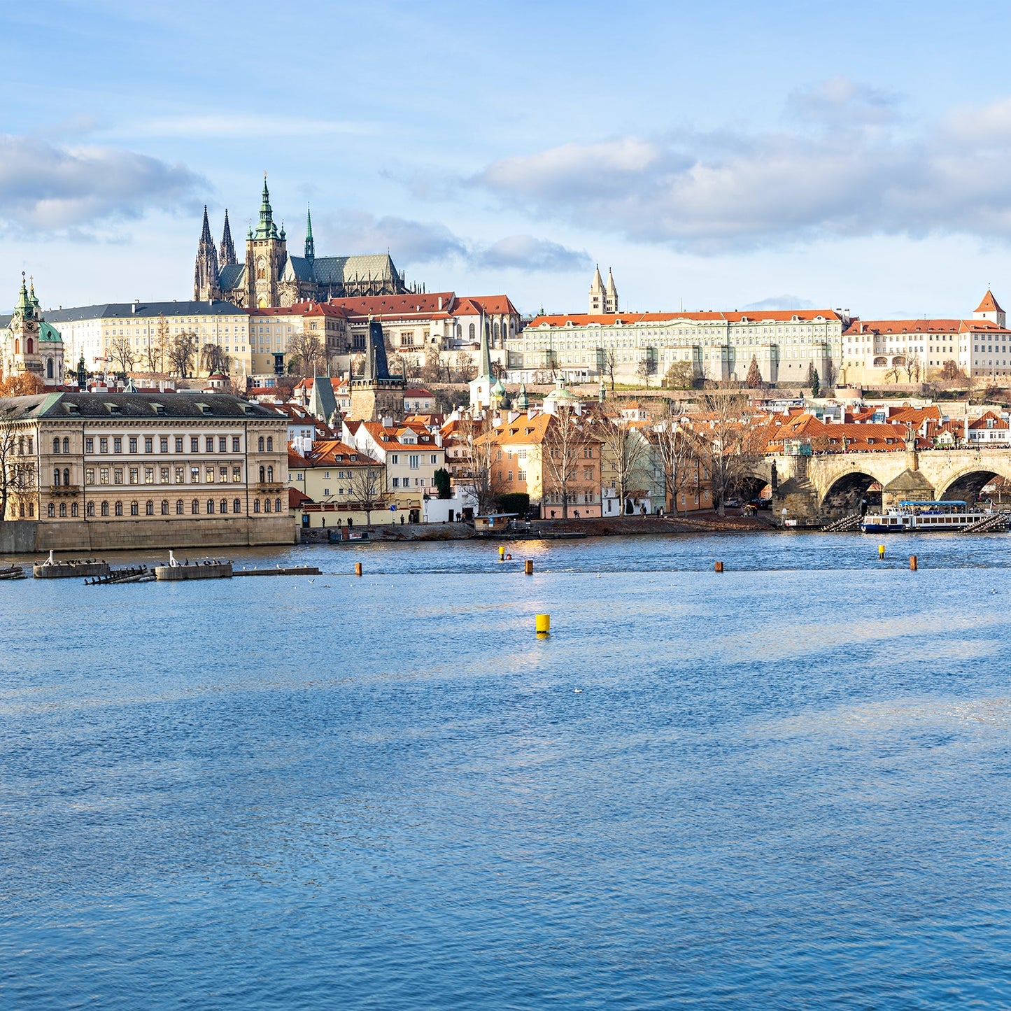 Thumbnail of  stunning panoramic view capturing the historic Charles Bridge as it stretches across the serene Vltava River. 