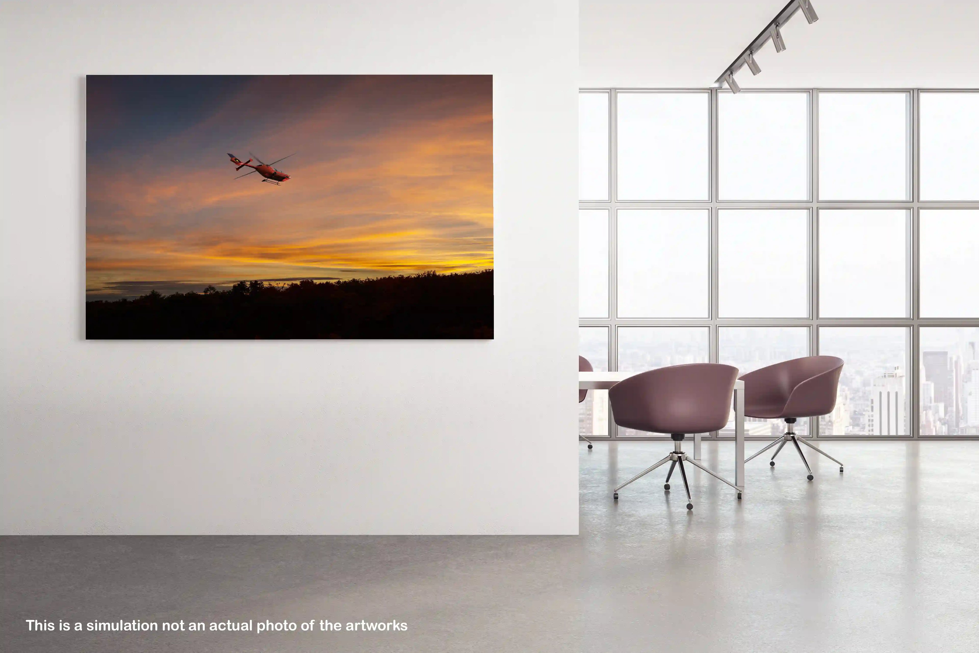 Artwork depicting a silhouette of a helicopter in flight against a sunset sky with orange and gold hues.